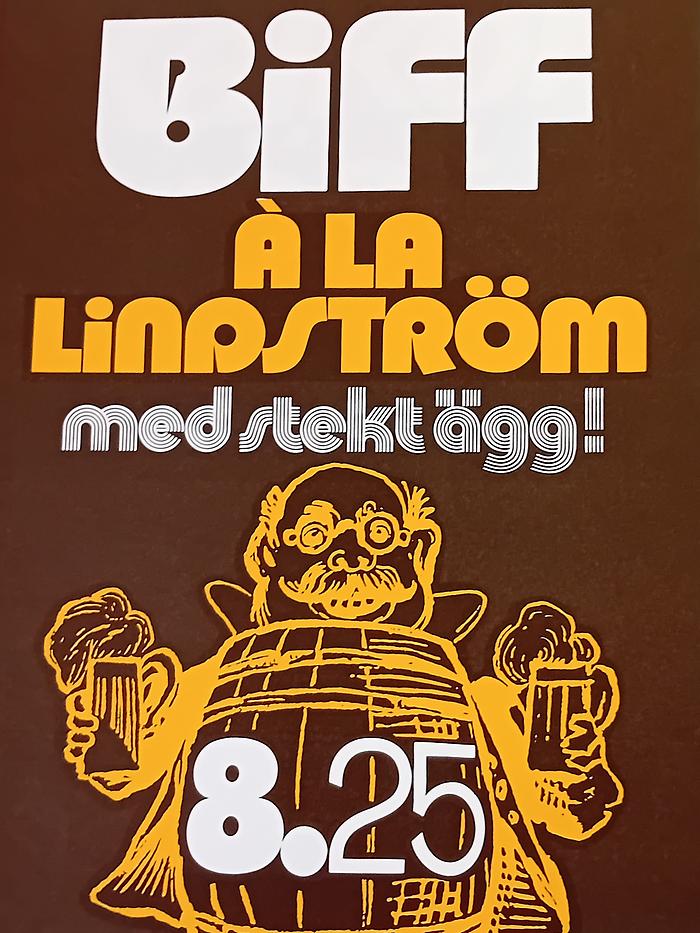 Affärstryck i brunt, gult och vitt.