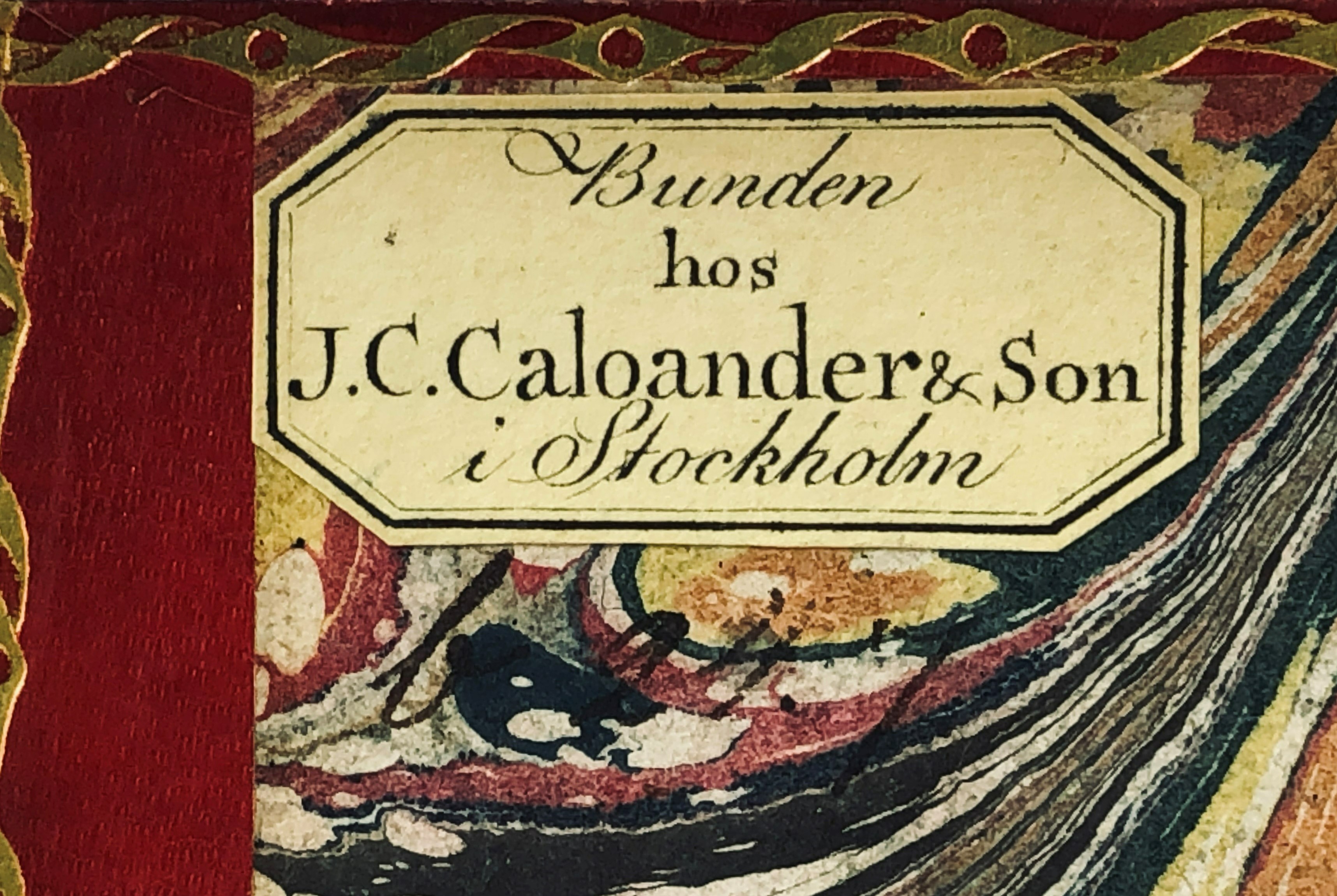 Bild på etikett med texten Bunden hos J.C. Caloander & Son i Stockholm