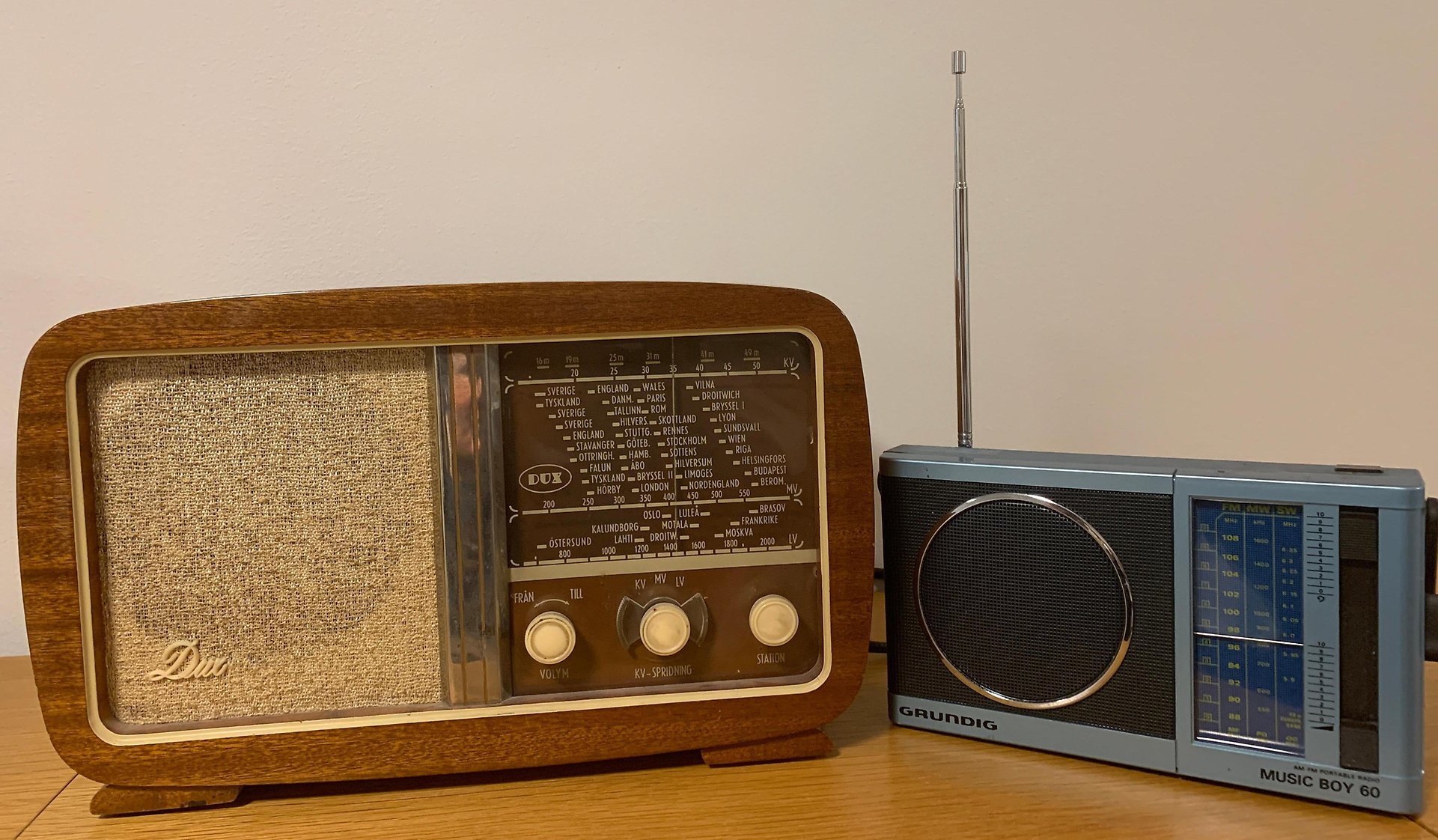 A pair of old radio sets.