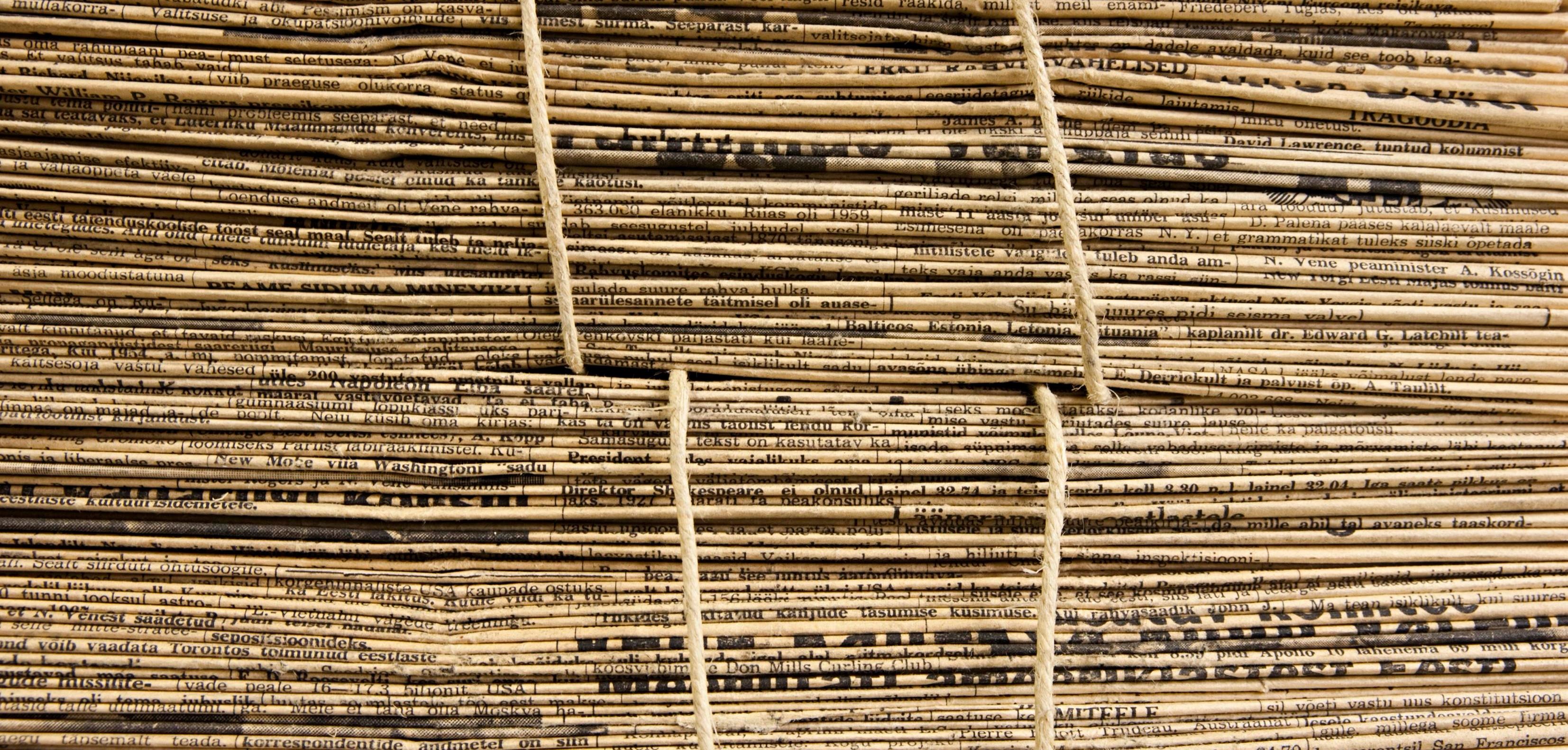 A stack of newspapers.