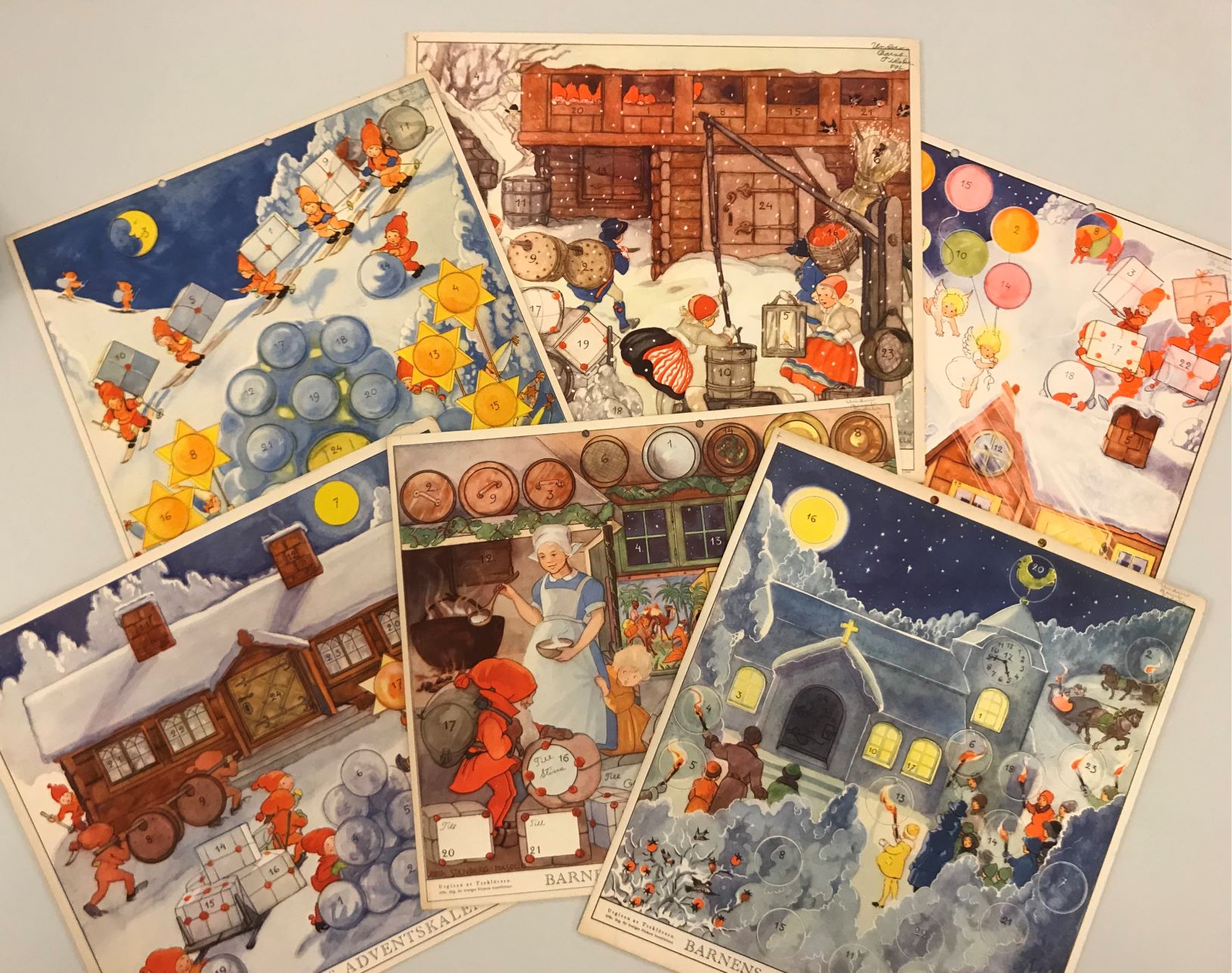 Sex exempel på Barnens adventskalender utgivna av Sveriges flickors scoutförbund