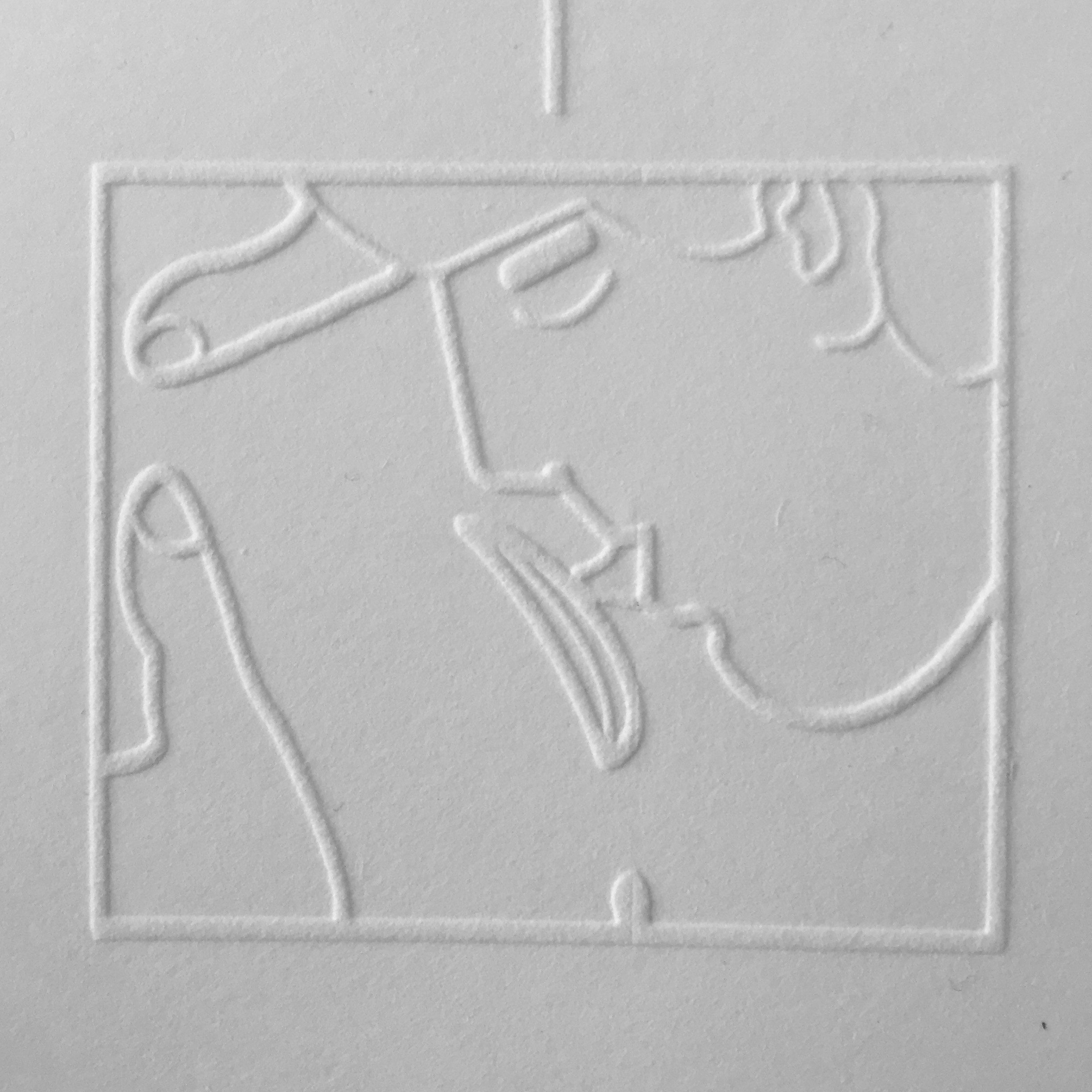 Pornografisk bild i relief på vitt papper.