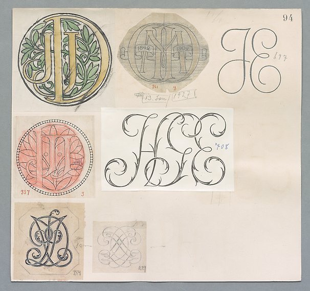Papper med olika snirkliga monogram.
