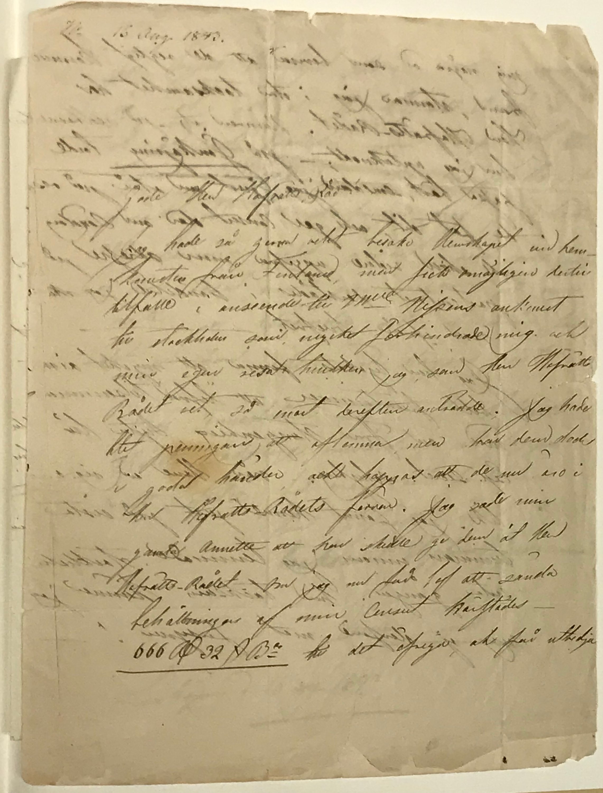 Ett brev med handskriven text i bläck.
